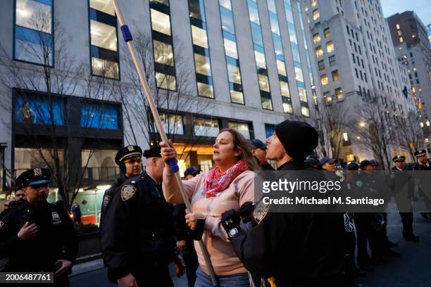 Person is arrested by NYPD as people march calling on Israel to stop its Rafah invasion in Gaza on February 12, 2024 in New York City. Israel...