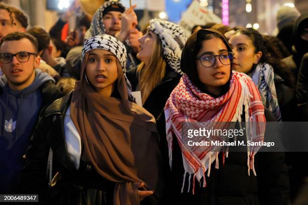 People march calling on Israel to stop its Rafah invasion in Gaza on February 12, 2024 in New York City. Israel launched airstrikes into Rafah...