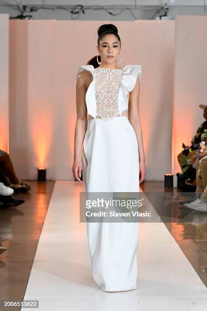 Model walks the runway wearing Karmic Couture during Model Icon NYFW S1 on February 12, 2024 in New York City.