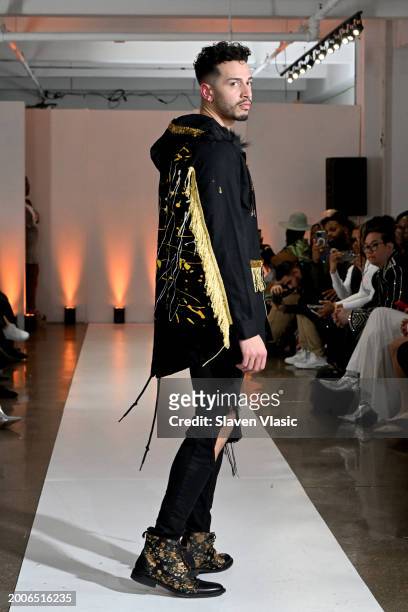Model walks the runway wearing Stra'T'gik Visionary & Co. During Model Icon NYFW S1 on February 12, 2024 in New York City.