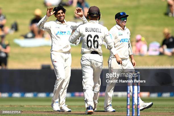 Rachin Ravindra of the New Zealand Black Caps celebrates the wicket of Zubayr Hamza of South Africa during day one of the Men's Second Test in the...
