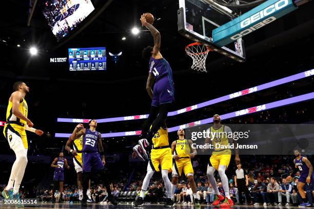 Nick Richards of the Charlotte Hornets dunks the ball during the first half of an NBA game against the Indiana Pacers at Spectrum Center on February...