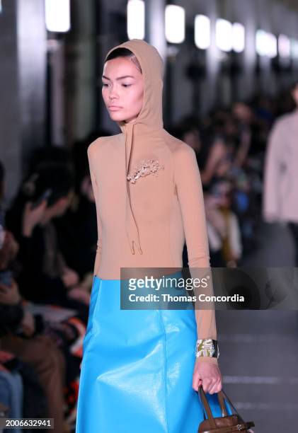 Model walks the runway during Tory Burch Fall/Winter 2024 New York Fashion Week at New York Public Library on February 12, 2024 in New York City.