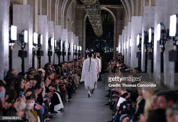 Models walk the runway during Tory Burch Fall/Winter 2024 New York Fashion Week at New York Public Library on February 12, 2024 in New York City.