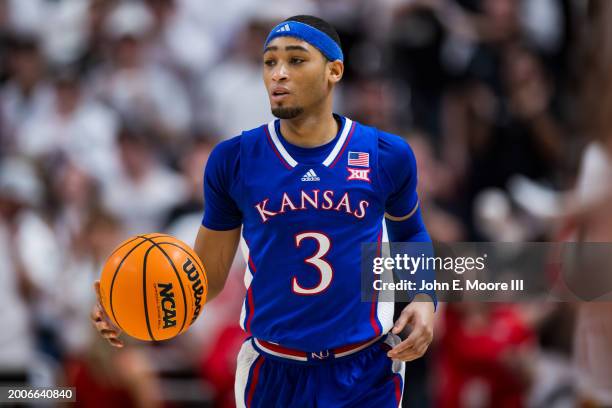 Dajuan Harris Jr. #3 of the Kansas Jayhawks handles the ball during the first half of the game against the Texas Tech Red Raiders at United...