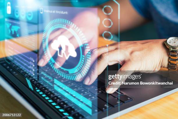 cloud computing hologram and the woman using a laptop computer. the concept of computer, artificial intelligence, internet and technology - cloud computing services stock pictures, royalty-free photos & images
