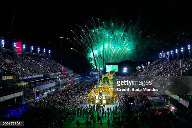 Fireworks explode as members of Mocidade perform during 2024 Carnival parades at Sapucai Sambodrome on February 12, 2024 in Rio de Janeiro, Brazil.