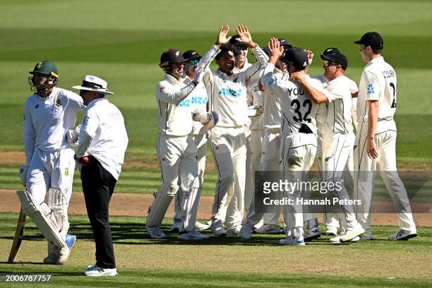 Will Young of the New Zealand Black Caps celebrates the wicket of David Bedingham of South Africa during day one of the Men's Second Test in the...