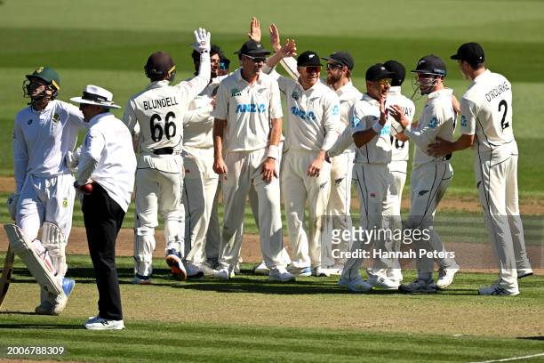 Will Young of the New Zealand Black Caps celebrates the wicket of David Bedingham of South Africa during day one of the Men's Second Test in the...