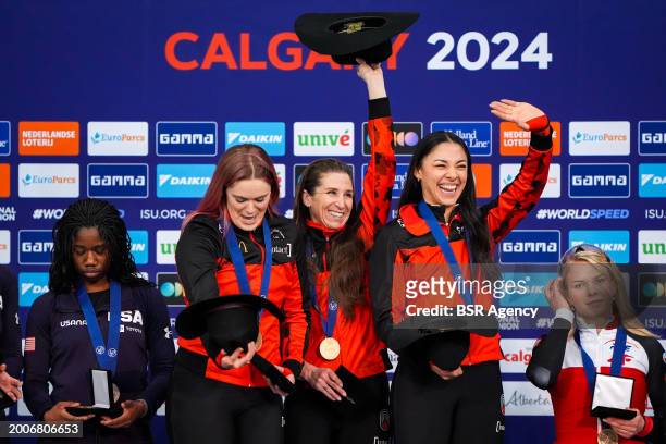 Carolina Hiller of Canada, Maddison Pearman of Canada and Ivanie Blondin of Canada during the podium ceremony after competing on the Women's Team...
