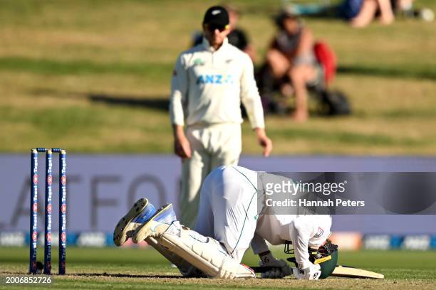 Ruan de Swardt of South Africa falls over after being hit during day one of the Men's Second Test in the series between New Zealand and South Africa...