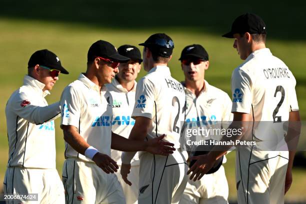 Neil Wagner congratulates Will O'Rourke of the New Zealand Black Caps during day one of the Men's Second Test in the series between New Zealand and...