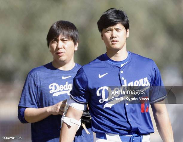 Shohei Ohtani and his interpreter Ippei Mizuhara are pictured at the Los Angeles Dodgers' spring training in Glendale, Arizona, on Feb. 15, 2024.