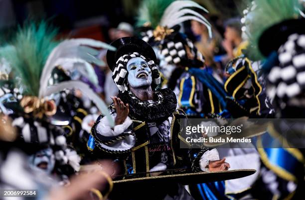 Members of Mangueira perform during 2024 Carnival parades at Sapucai Sambodrome on February 12, 2024 in Rio de Janeiro, Brazil.
