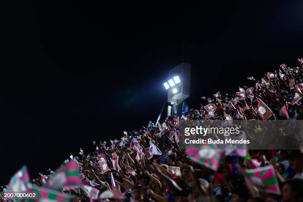 Fans cheer during the Mangueira parade during 2024 Carnival parades at Sapucai Sambodrome on February 12, 2024 in Rio de Janeiro, Brazil.