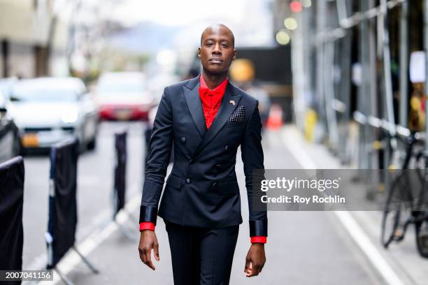 Charlii Sebunya wears a J.Crew suit outside the Pamella Roland Show at Starrett-Lehigh Building during New York Fashion Week on February 12, 2024 in...