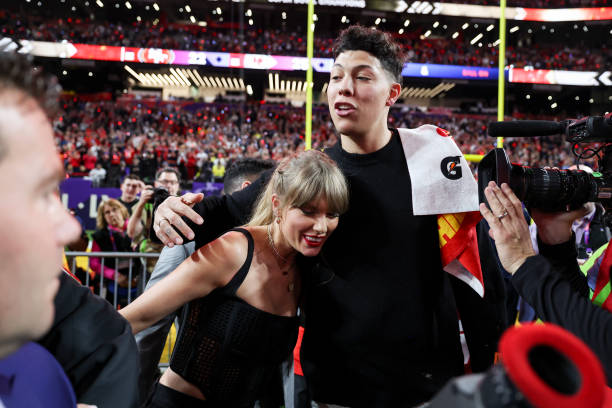 Taylor Swift and Jackson Mahomes embrace after Super Bowl LVIII against the San Francisco 49ers at Allegiant Stadium on February 11, 2024 in Las...