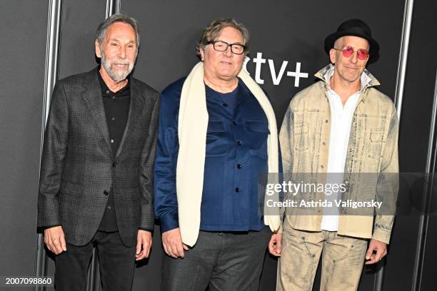 Mark A. Baker, Lorenzo di Bonaventura and Todd A. Kessler attend the premiere of Apple TV+'s "The New Look" at at Florence Gould Hall on February 12,...