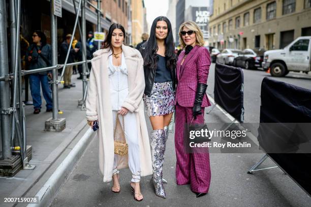 Sabrina Congioo, Margo Sah and Olga Ferrara are outside the Pamella Roland Show at Starrett-Lehigh Building during New York Fashion Week on February...