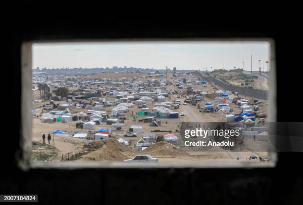 General view of makeshift tents as Palestinians, who fled from Israeli attacks and sought refuge in Rafah city, try to live in makeshift tents they...
