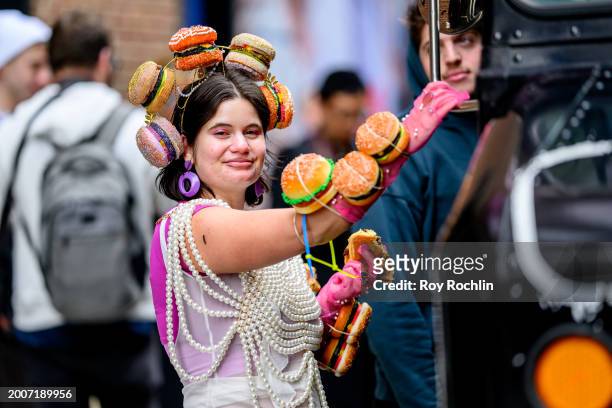 Artist Vita Kari wears a Hamburger inspired ensemble outside the Pamella Roland Show at Starrett-Lehigh Building during New York Fashion Week on...