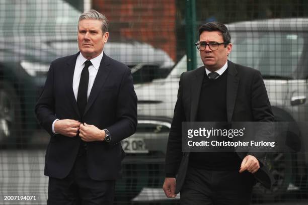 Sir Keir Starmer, leader of the Labour Party and Andy Burnham, Mayor of Greater Manchester, arrive at St Hugh of Lincoln RC Church ahead of the...