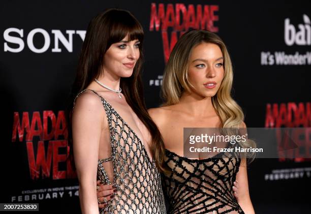 Dakota Johnson and Sydney Sweeney attend the World Premiere of Sony Pictures' "Madame Web" at Regency Village Theatre on February 12, 2024 in Los...