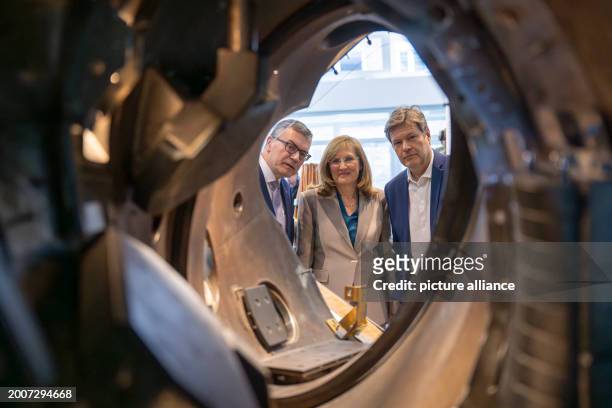 February 2024, Bavaria, Garching: Florian Herrmann , Head of the Bavarian State Chancellery, Sibylle Günter, Scientific Director of the Institute,...