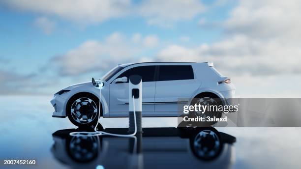 electric car charging - stromtankstelle stock-fotos und bilder