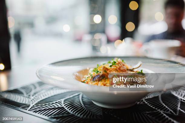 classic risotto with mushrooms and vegetables - risotto stock pictures, royalty-free photos & images