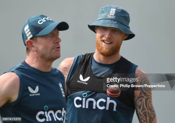 Ben Stokes and Paul Collingwood of England talk during the England Net Session at Saurashtra Cricket Association Stadium on February 13, 2024 in...