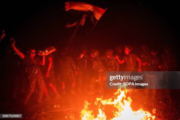 Members of Karenni Resistance Force celebrate mission accomplishment in their base, in Shadaw Township. As one of the missions of 1111 Operation,...