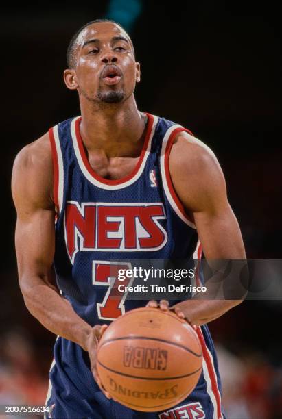 Kenny Anderson, Point Guard for the New Jersey Nets prepares to shoot a free throw during the NBA Midwest Division basketball game against the Denver...