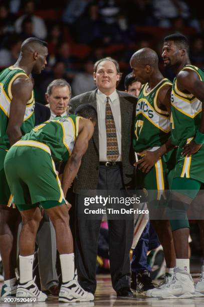 George Karl, Head Coach for the Seattle SuperSonics looks on from the sideline during NBA Midwest Division basketball game against the Denver Nuggets...