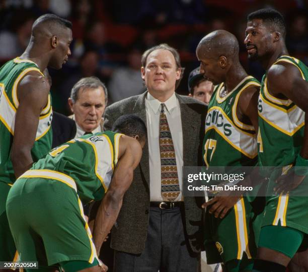 George Karl, Head Coach for the Seattle SuperSonics looks on from the sideline during NBA Midwest Division basketball game against the Denver Nuggets...