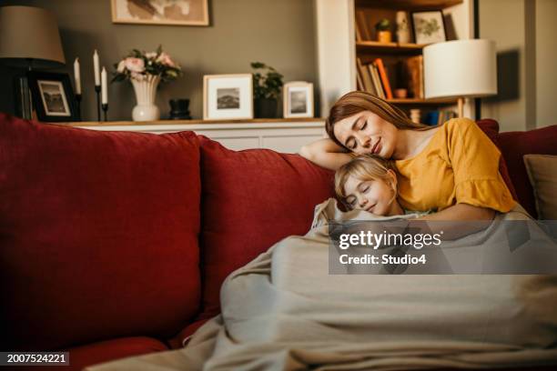 mom and daughter nap time - blanket stock pictures, royalty-free photos & images