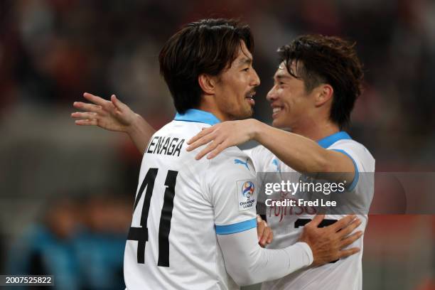 Akihiro Ienaga of Kawasaki Frontale celebrates with teammate Yusuke Segawa after scoring the team's third goal during the AFC Champions League Round...