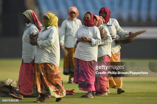 Groundstaff leave the field during the England Net Session at Saurashtra Cricket Association Stadium on February 13, 2024 in Rajkot, India.
