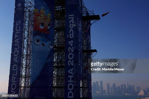 Constantin Popovici of Team Romania competes in the Men's 27m High Diving Rounds 1 & 2 on day twelve of the Doha 2024 World Aquatics Championships at...