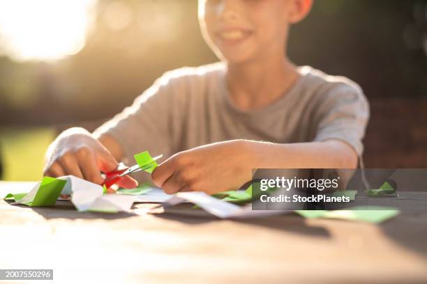 Boy Using Paper 880 Paper Boy Drawing Stock Photos, High-Res Pictures, and Images ...