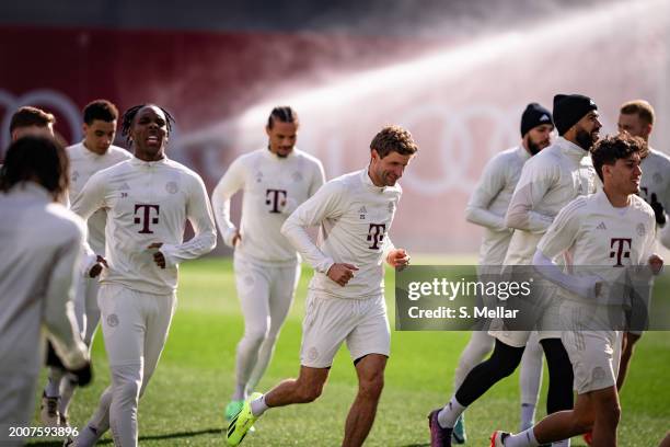 Thomas Mueller of FC Bayern Muenchen and the team of FC Bayern Muenchen run at Saebener Strasse training ground on February 13, 2024 in Munich,...