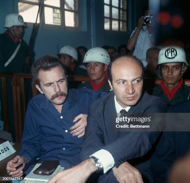 French journalist Régis Debray and Argentine painter Ciro Bustos during their trial for guerrilla activities, in Camiri, Bolivia, October 26th 1967.