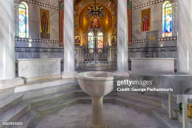 marble baptismal font in a greek orthodox church - chapel stock pictures, royalty-free photos & images