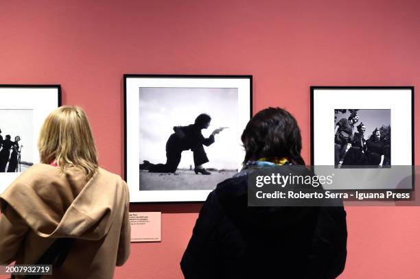 Visitors admires the pictures by german photojournalist Gerda Taro and hungarian photojournalist Robert Capa part of the exhibition "Robert Capa E...