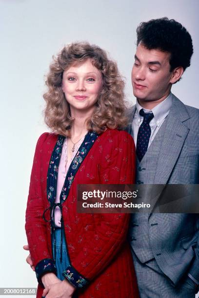 Publicity portrait of American actors Shelley Long and Tom Hanks for the film 'The Money Pit' as they pose against a white background, Los Angeles,...