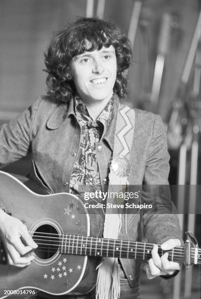 Scottish Folk & Rock musician Donovan plays guitar in a recording studio, 1967.