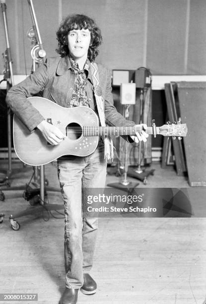 Scottish Folk & Rock musician Donovan plays guitar in a recording studio, 1967.