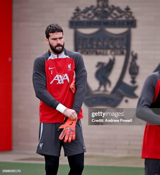 Alisson Becker of Liverpool during a training session at AXA Training Centre on February 13, 2024 in Kirkby, England.