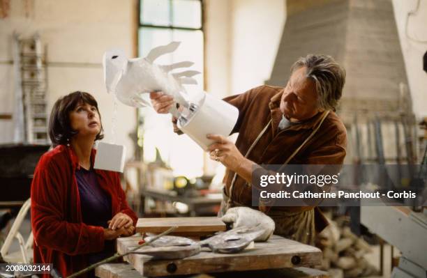 Elizabeth Garouste with her husband Gérard Garouste in her workshop studio on July 20, 2008 in Marcilly-sur-Eure, France.