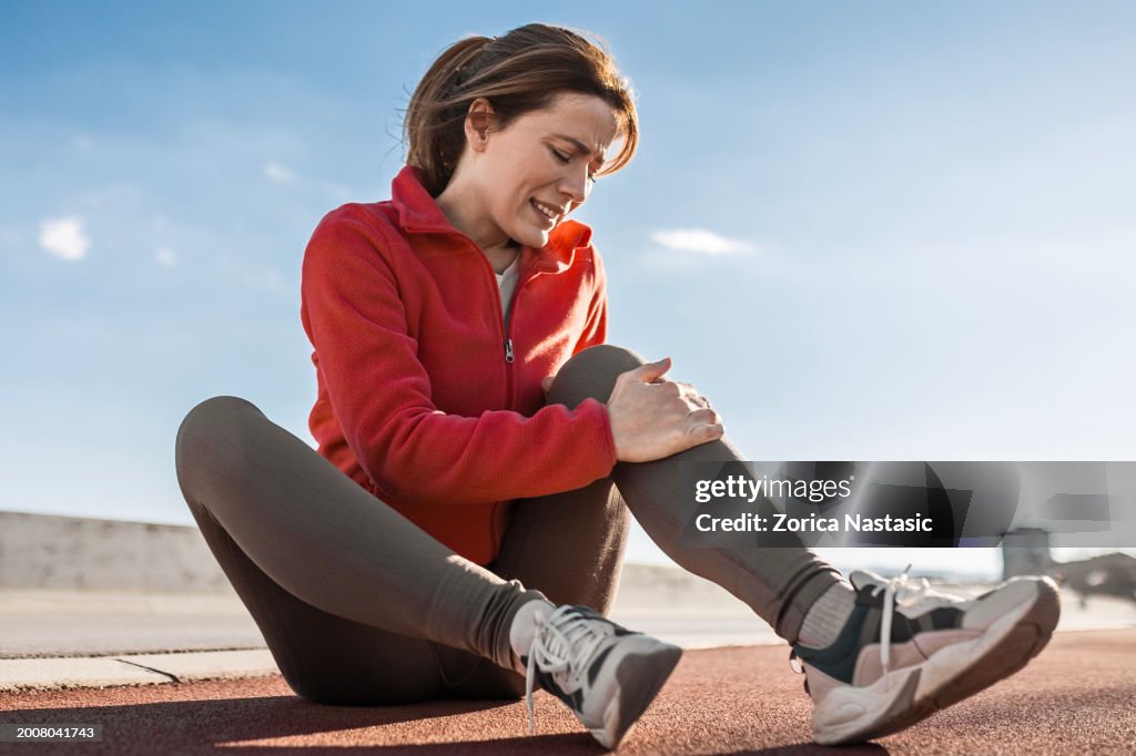 Sportswoman Faces Injury at the Bridge